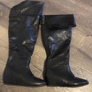 Over the knee wedge boots
